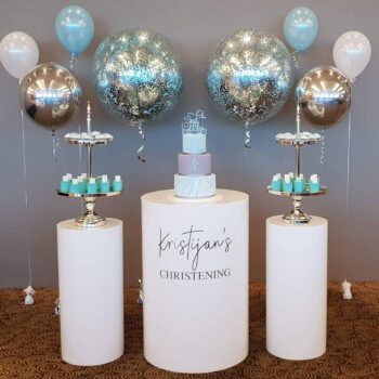 White plinths and silver cake stands