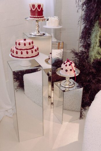 Mirror Plinths with cake stands for hire. On Trend Event Hire