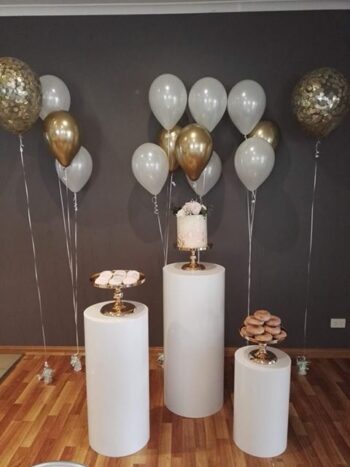 Round white plinths birthday