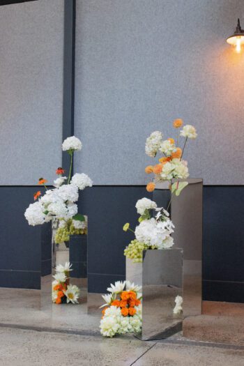 Silver Mirror Plinths hire Melbourne. On Trend Event Hire.